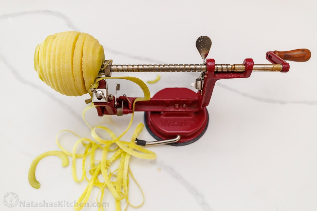 apple peeler removing peel from apple
