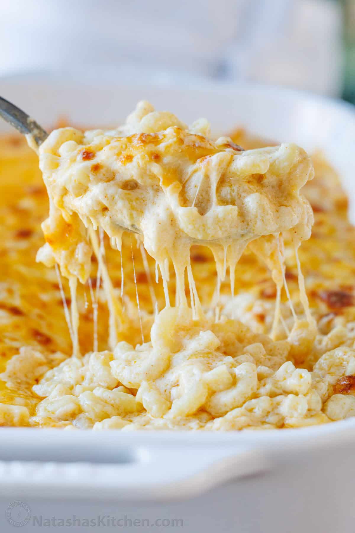 Baked Mac and Cheese scooped from a baking dish