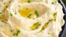 These creamy mashed potatoes are shockingly good! Learn the secrets to the best mashed potatoes recipe. Whipped, velvety and holiday worthy mashed potatoes! | natashaskitchen.com