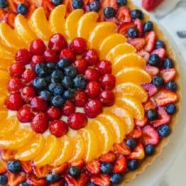 Whole fruit tart on platter