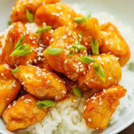 Honey Garlic Chicken Served over a bed of white rice