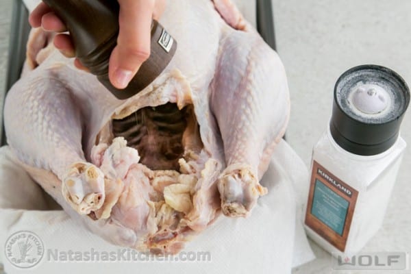 Seasoning inside turkey carcass