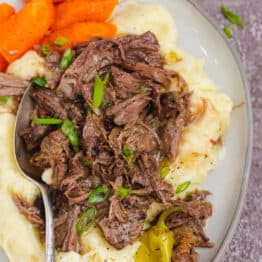Mississippi Pot Roast served over mashed potatoes