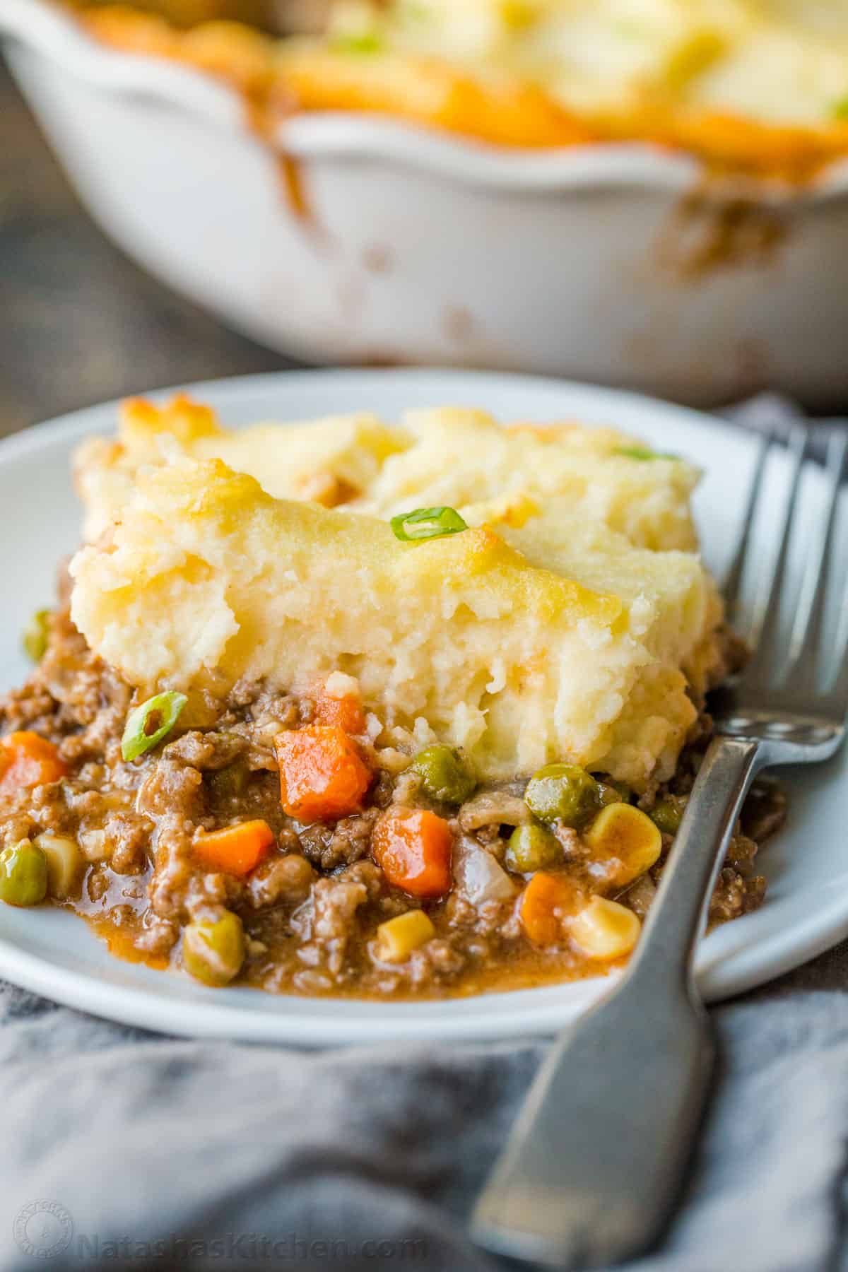 Shepherd's Pie slice on a plate with fork