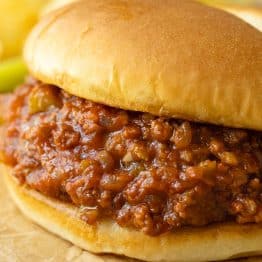 Sloppy Joe up close with saucy sloppy joe filling in a bun