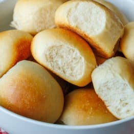 Sourdough Dinner Rolls pulled apart and served in a white bowl
