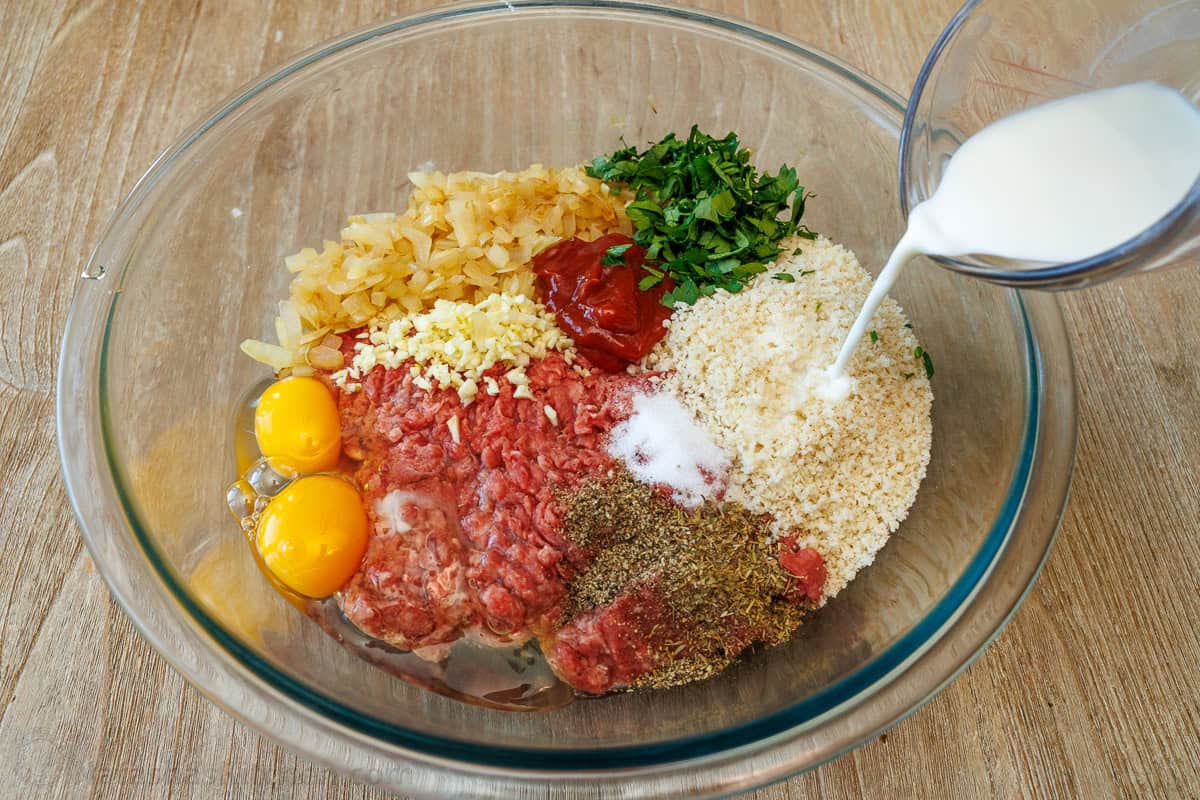 Meatloaf ingredients combined in a mixing bowl